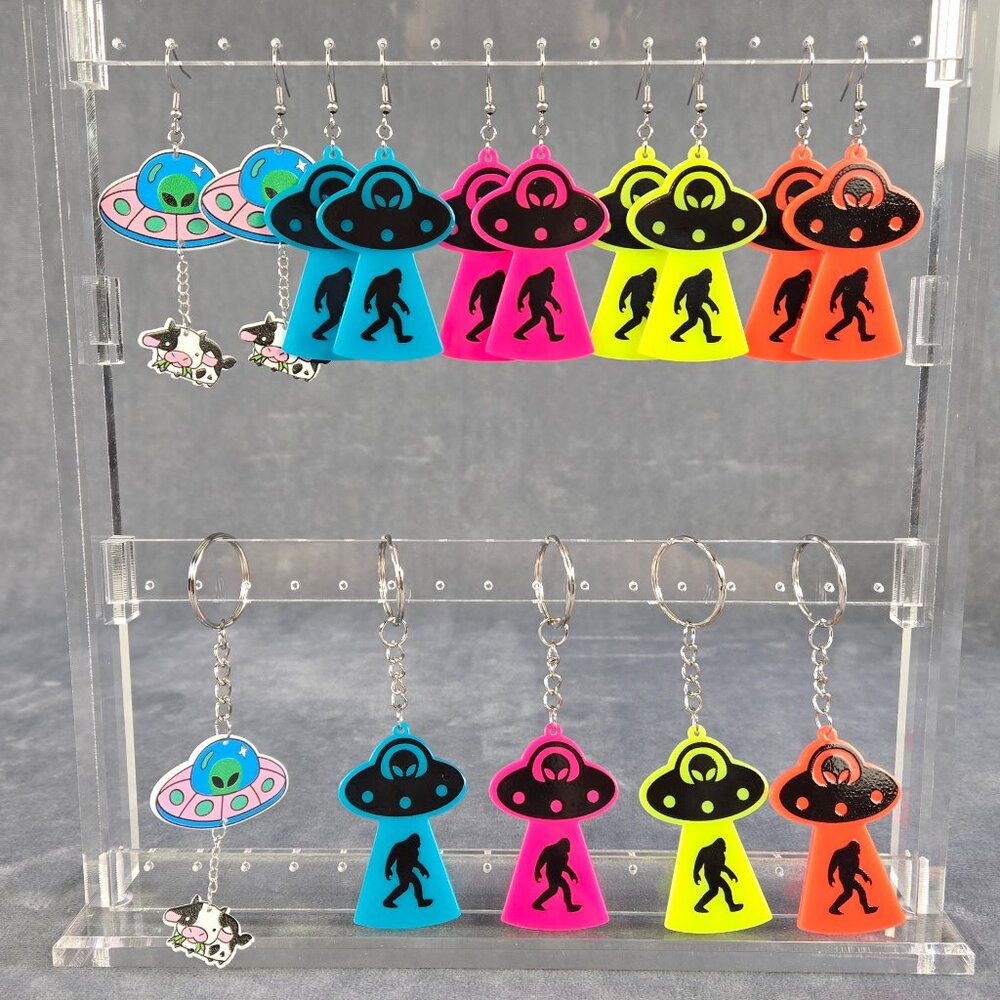 UFO with Big Foot and UFO with Cow Dangle Neon Earrings and Neon Keychains